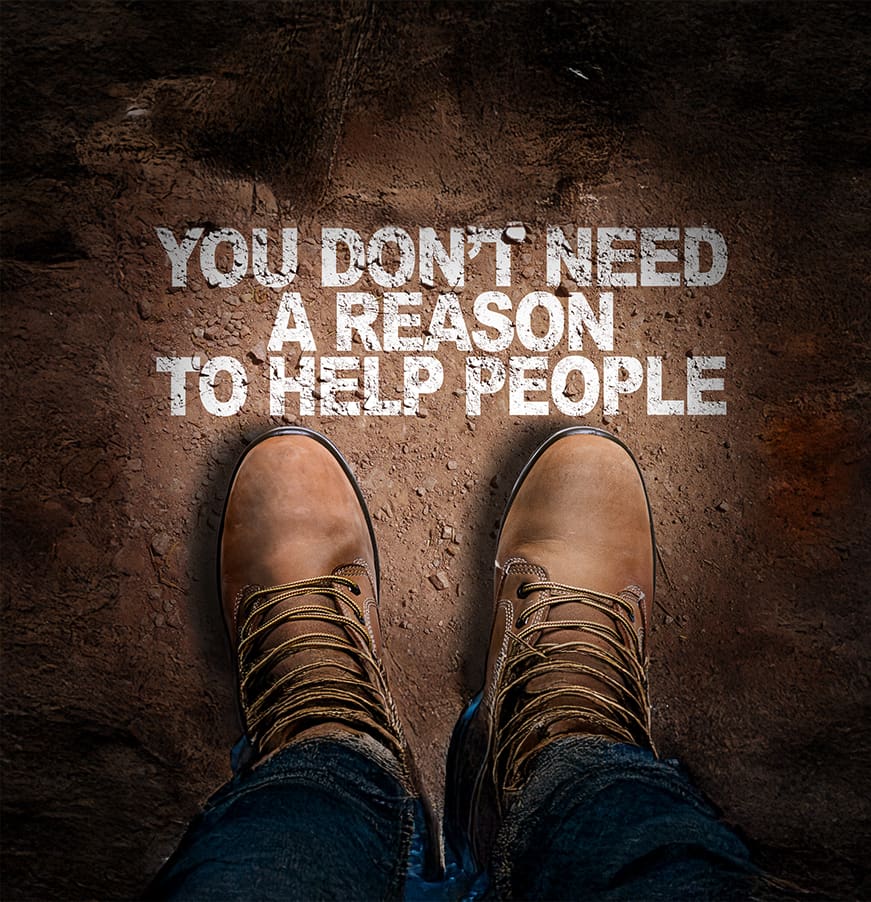 Top View of Boot on the trail with the text: You Don't Need a Reason to Help People
